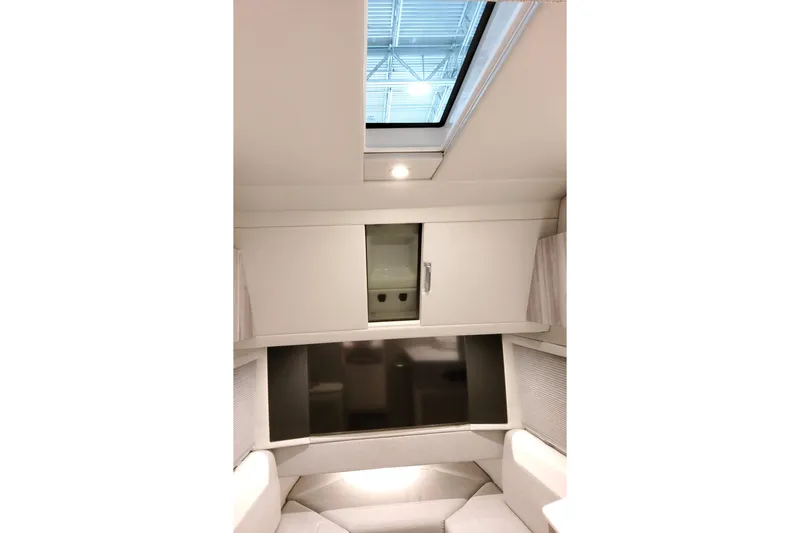 Slide: The Image of Interior cabin of 2026 Formula 457 Center Console Fish boat with skylight. - 80