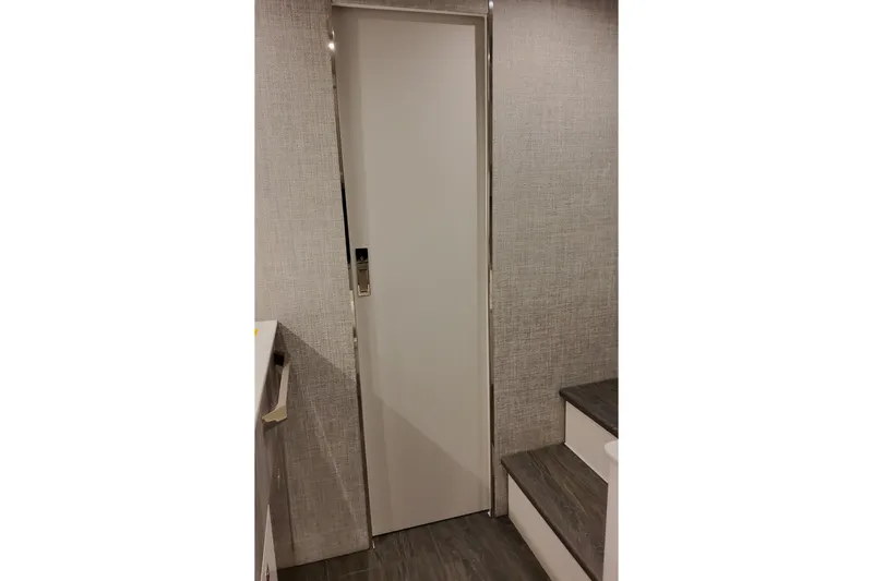 Slide: The Image of Interior view of 2026 Formula 457 Center Console Fish boat, featuring a sleek door design. - 84