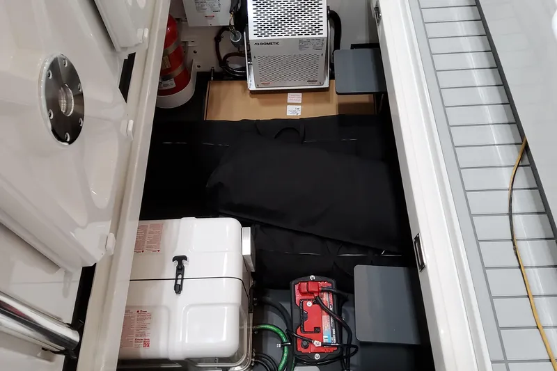 Slide: The Image of Interior view of 2026 Formula 457 Center Console Fish boat's storage compartment. - 96