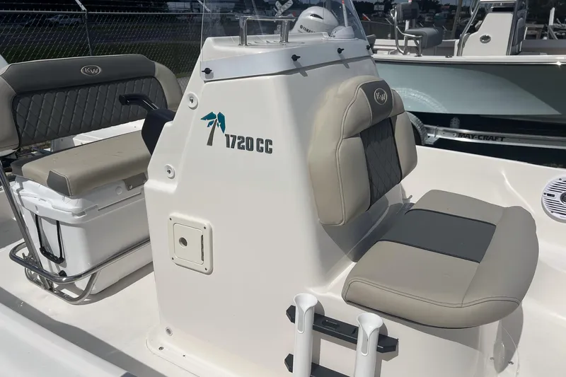 Slide: The Image of 2026 Key West 1720 Center Console boat interior with seating and console details. - 11
