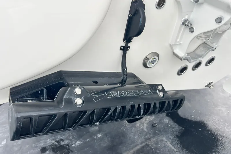 Slide: The Image of Key West 291 FS 2026 boat with Seakeeper stabilizer detail. - 13