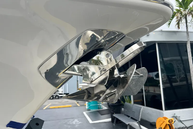 Slide: The Image of 2026 Key West 291 FS boat anchor detail with polished metal finish. - 14