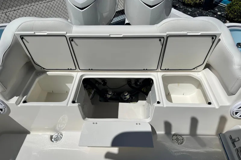 Slide: The Image of 2026 Key West 291 FS boat storage compartments and seating area. - 21