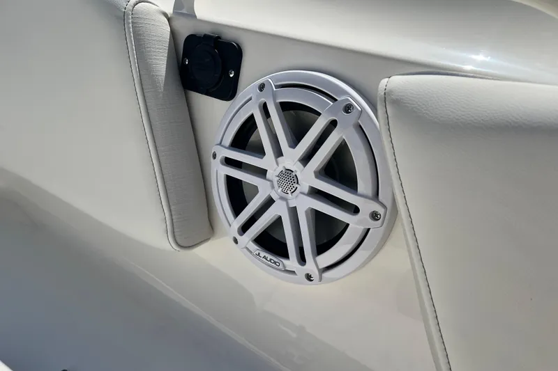 Slide: The Image of 2026 Key West 291 FS boat speaker detail with white upholstery. - 29