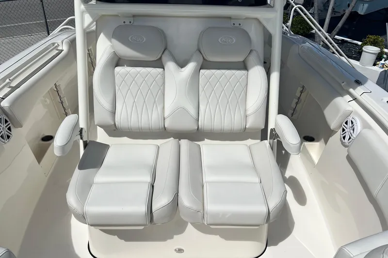 Slide: The Image of Luxury seating on 2026 Key West 291 FS boat, featuring white cushioned seats. - 30