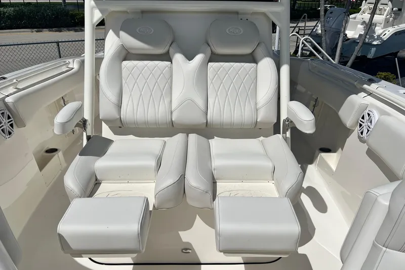 Slide: The Image of Luxury seating on 2026 Key West 291 FS boat, featuring white cushioned seats. - 31