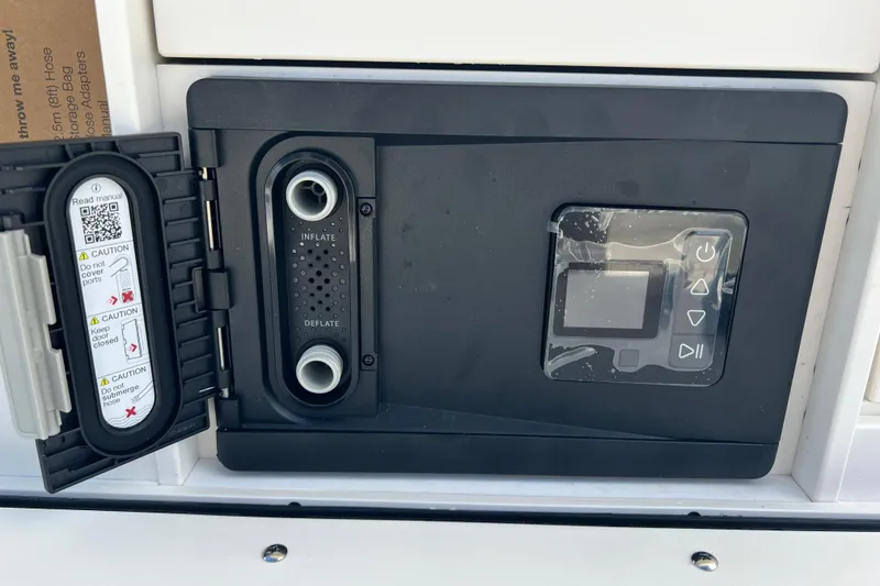 Slide: The Image of Control panel of 2026 Key West 291 FS boat with inflate and deflate options. - 37