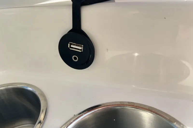 Slide: The Image of USB and audio port on 2026 Key West 291 FS boat interior. - 43