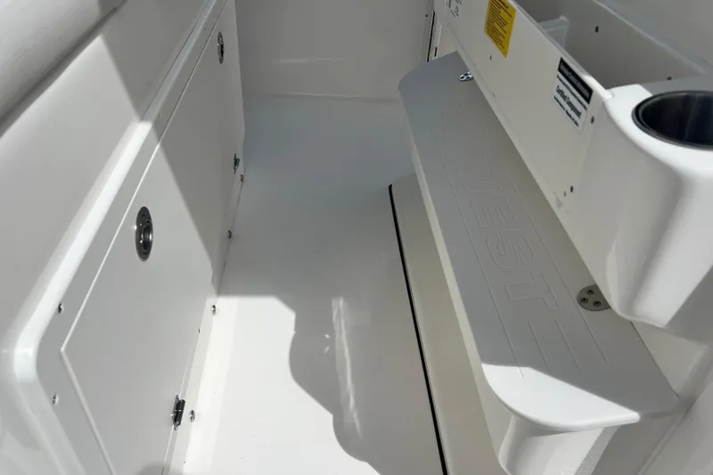 Slide: The Image of Interior view of 2026 Key West 291 FS boat, featuring storage compartments and seating. - 47