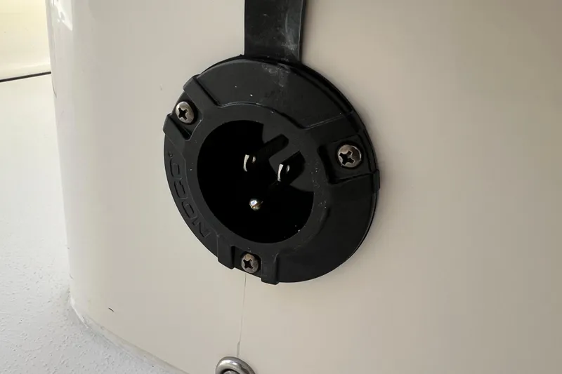 Slide: The Image of Close-up of a NOCO power socket on a 2026 Key West 291 FS boat. - 58