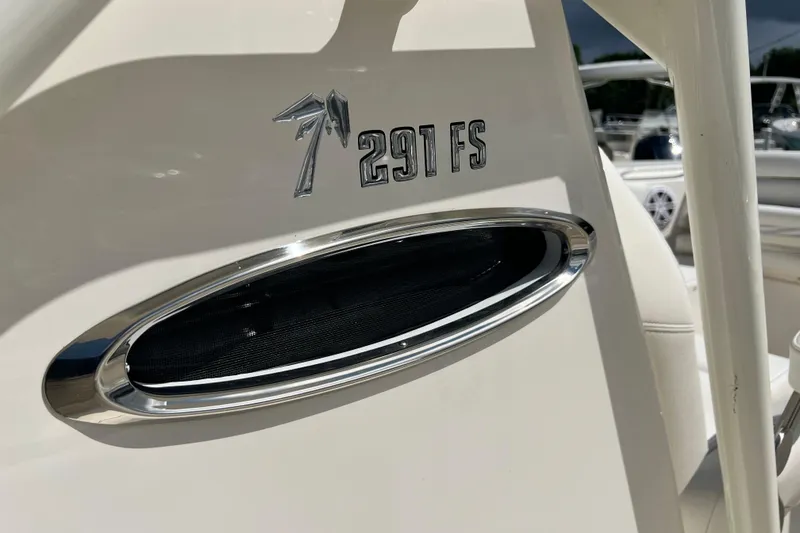 Slide: The Image of 2026 Key West 291 FS boat emblem and design detail. - 59