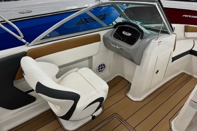 Slide: The Image of 2024 Chaparral 19 SSi OB boat interior with modern helm and seating. - 8