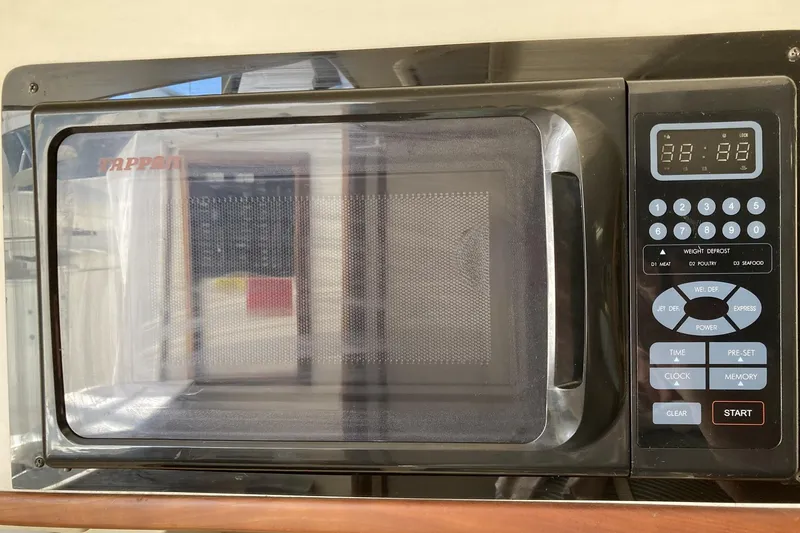 Slide: The Image of Microwave oven with digital controls on a 2006 Luhrs 28 boat. - 19