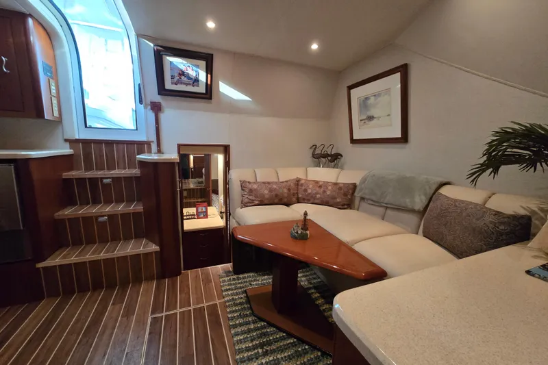 Slide: The Image of Luxurious interior of a 1999 Ocean Yachts 40 Open, featuring elegant seating and decor. - 31