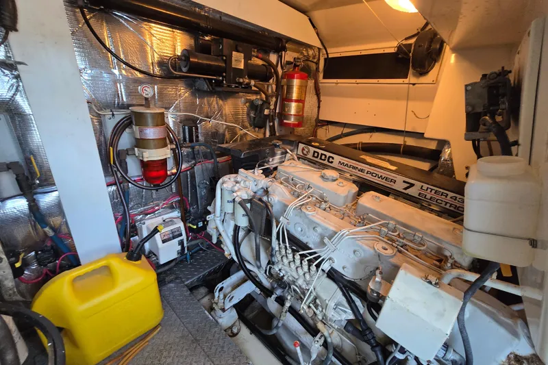 Slide: The Image of Engine room of 1999 Ocean Yachts 40 Open with DDC Marine Power engine. - 37