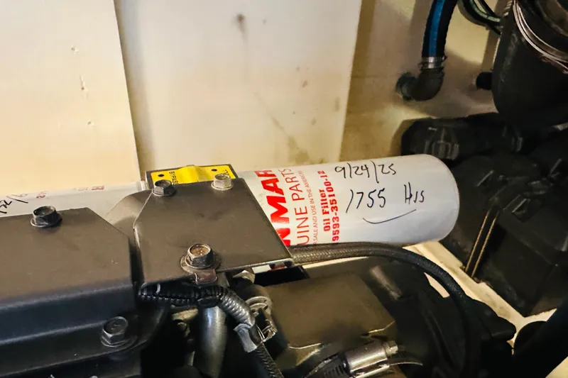 Slide: The Image of Engine compartment of 2006 Sabre 42 Fly Bridge with Yanmar oil filter. - 36