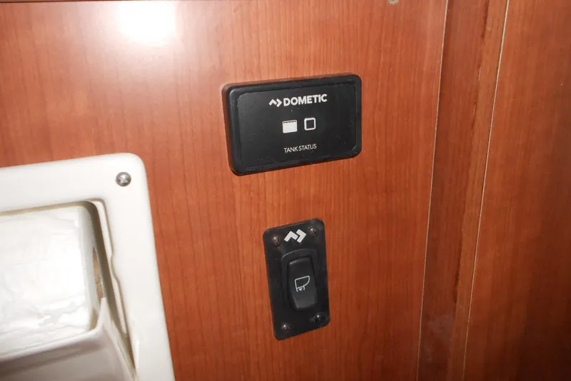 Slide: The Image of Control panel on 2022 Stingray 269 DC boat, featuring Dometic tank status indicators. - 9