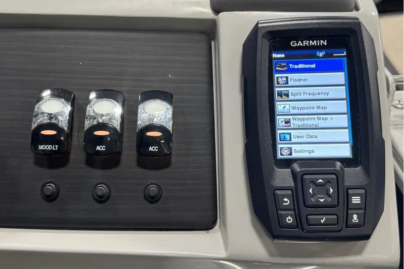 Slide: The Image of Control panel of a 2021 Bennington L 25 Swingback with Garmin navigation system. - 18