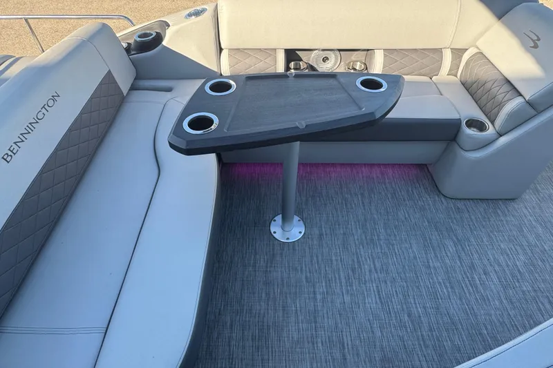 Slide: The Image of 2021 Bennington L 25 Swingback boat interior with seating and table. - 23