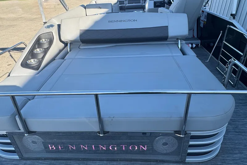 Slide: The Image of 2021 Bennington L 25 Swingback boat with luxurious seating and cup holders. - 26