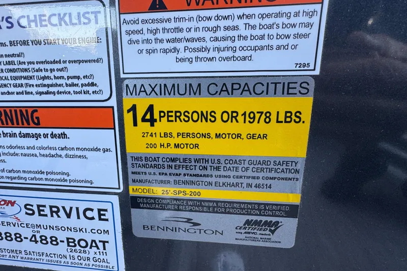 Slide: The Image of Capacity warning label on 2021 Bennington L 25 Swingback boat, 14 persons or 1978 lbs. - 33