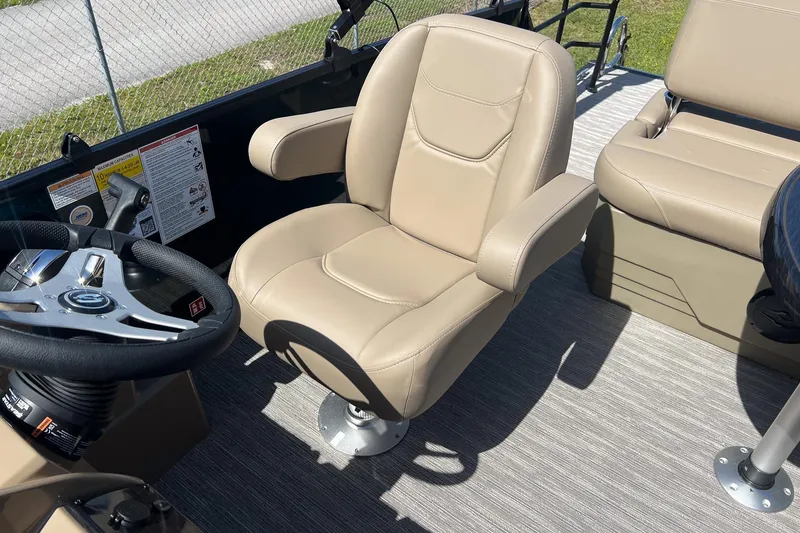 Slide: The Image of Captain's chair and steering wheel of 2026 Sylvan Mirage 822 CLZ pontoon boat. - 13