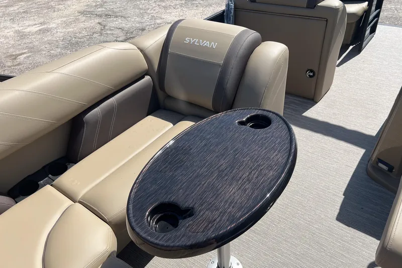 Slide: The Image of Luxurious seating and table on 2026 Sylvan Mirage 822 CLZ pontoon boat. - 16