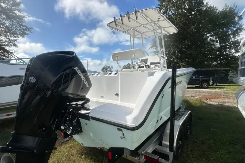 Slide: The Image of 2023 Aquasport 2200 Center Console boat with Mercury engine on trailer. - 5