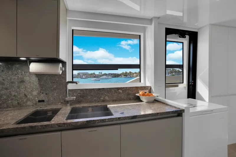 Slide: The Image of Modern kitchen interior of 2023 Sanlorenzo SL96A yacht with ocean view. - 10