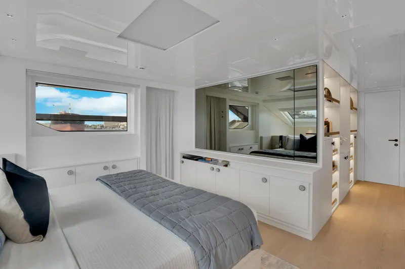 Slide: The Image of Luxurious 2023 Sanlorenzo SL96A yacht bedroom with modern design and ocean view. - 13