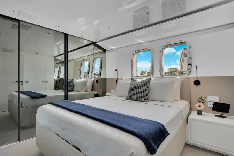 Slide: The Image of Luxurious bedroom interior of 2023 Sanlorenzo SL96A yacht with modern decor and ocean view. - 17