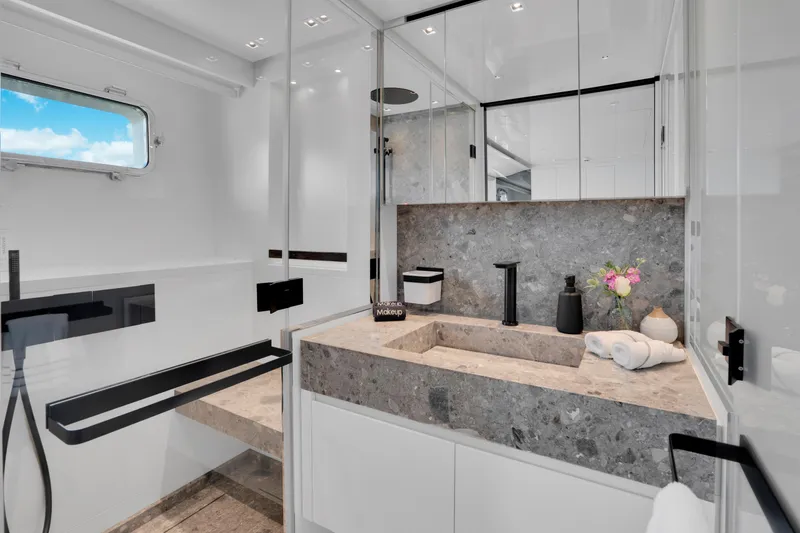 Slide: The Image of Luxurious bathroom in 2023 Sanlorenzo SL96A yacht with modern fixtures and elegant design. - 18