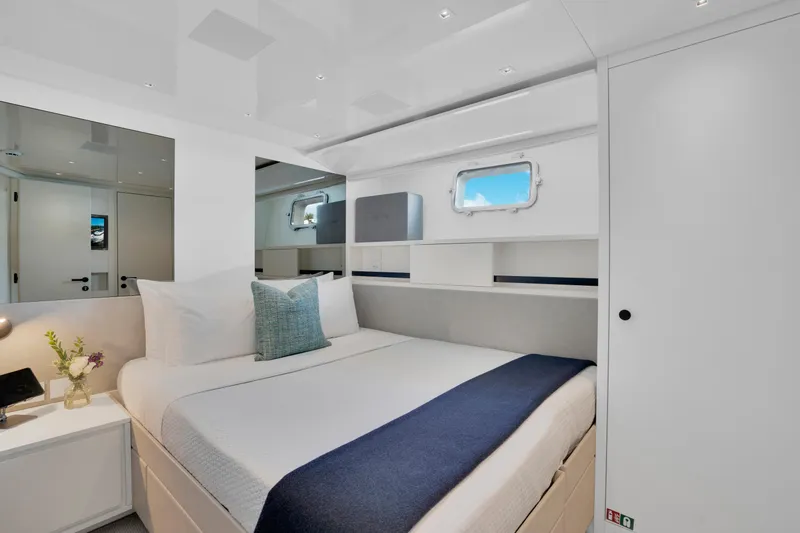 Slide: The Image of Luxurious bedroom interior of 2023 Sanlorenzo SL96A yacht with modern design and cozy bedding. - 23