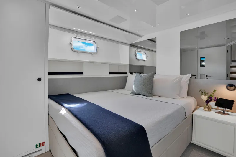 Slide: The Image of Luxurious bedroom interior of 2023 Sanlorenzo SL96A yacht with modern design and elegant decor. - 26