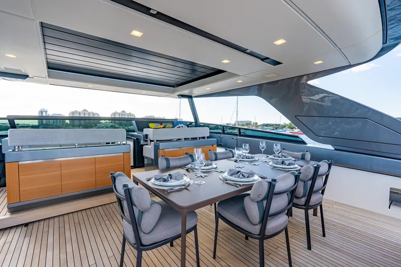 Slide: The Image of Luxurious 2023 Sanlorenzo SL96A yacht dining area with elegant table setting. - 34
