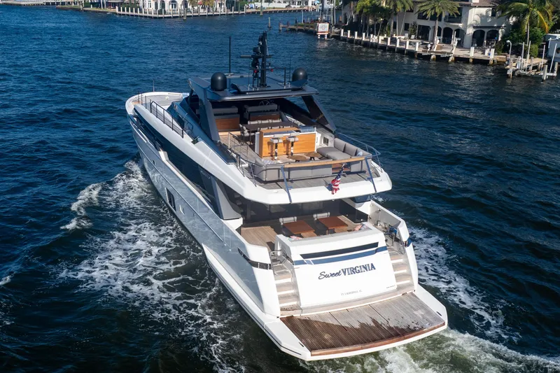 Slide: The Image of 2023 Sanlorenzo SL96A luxury yacht cruising on a scenic waterway. - 48