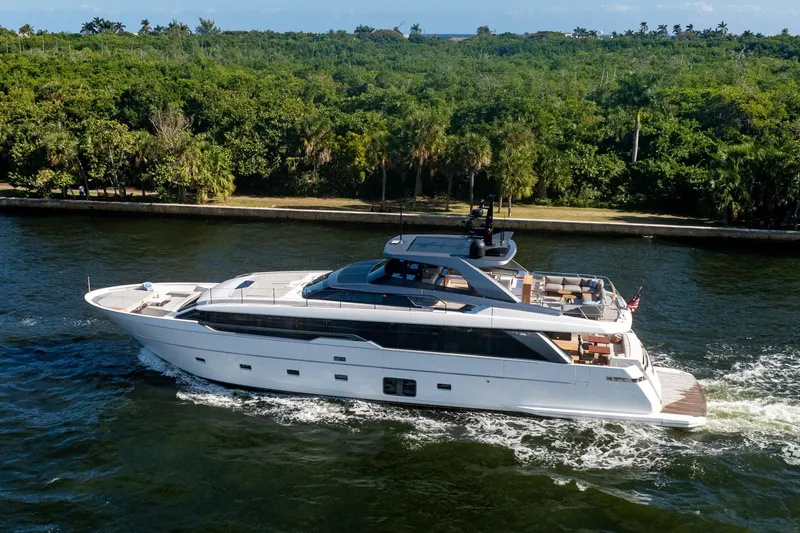 Slide: The Image of 2023 Sanlorenzo SL96A yacht cruising on a scenic waterway. - 49
