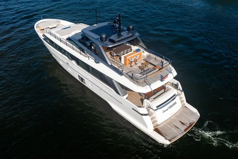 Slide: The Image of 2023 Sanlorenzo SL96A luxury yacht cruising on open water. - 58