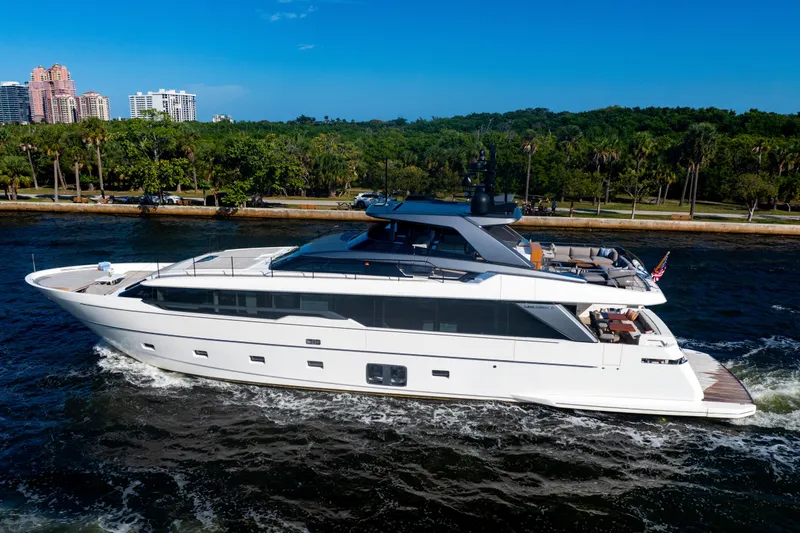 Slide: The Image of 2023 Sanlorenzo SL96A yacht cruising on a scenic waterway. - 59