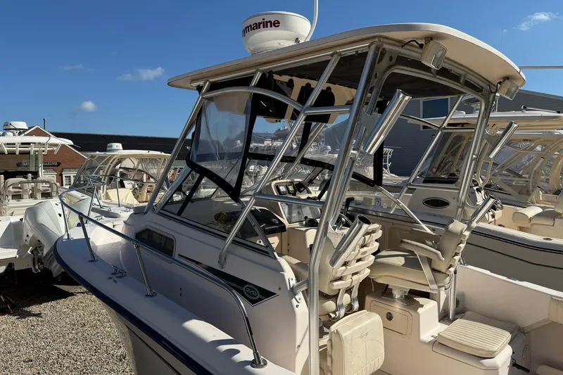 Slide: The Image of 2008 Grady-White Seafarer 228 boat with sleek design and spacious seating. - 1