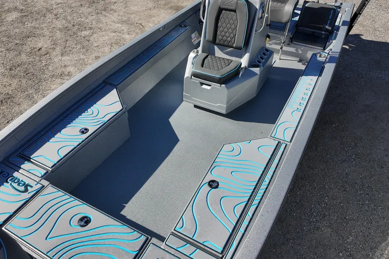 Slide: The Image of 2026 Xpress H24B Bay boat interior with stylish seating and storage compartments. - 13