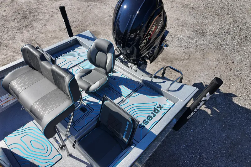 Slide: The Image of 2026 Xpress H24B Bay boat interior with Yamaha engine, featuring stylish seating and deck design. - 15