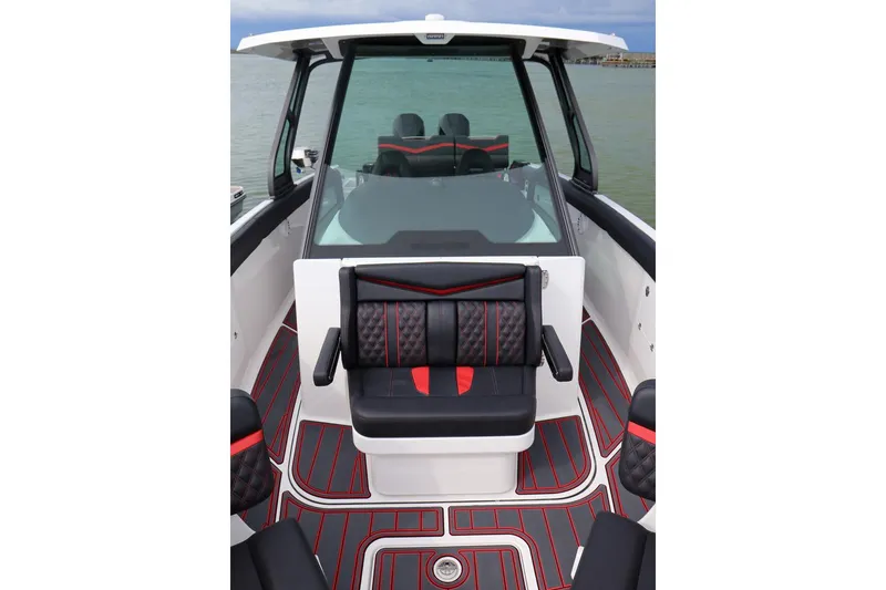 Slide: The Image of 2026 Monterey Elite 30 OB boat interior with sleek design and modern dashboard. - 5
