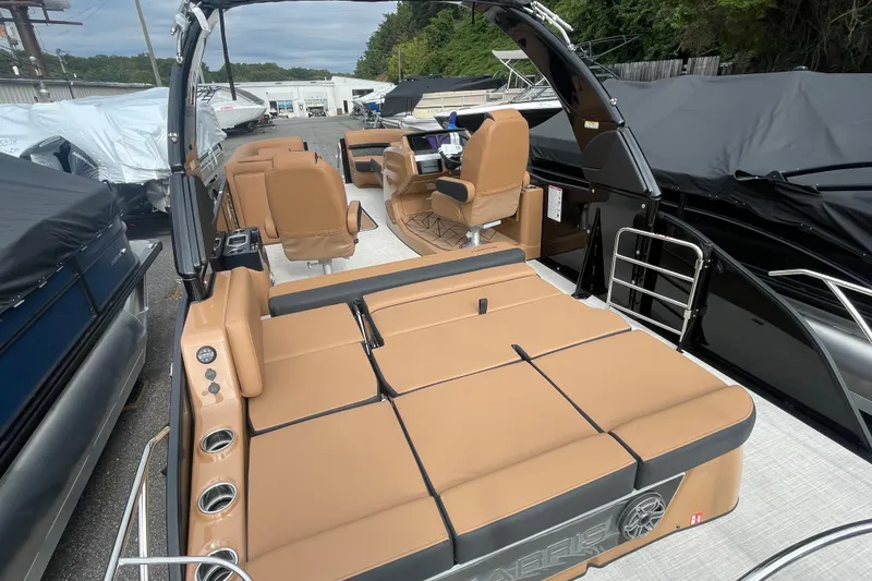 Slide: The Image of 2026 Harris Grand Mariner 250 pontoon boat with luxurious seating and modern design. - 15
