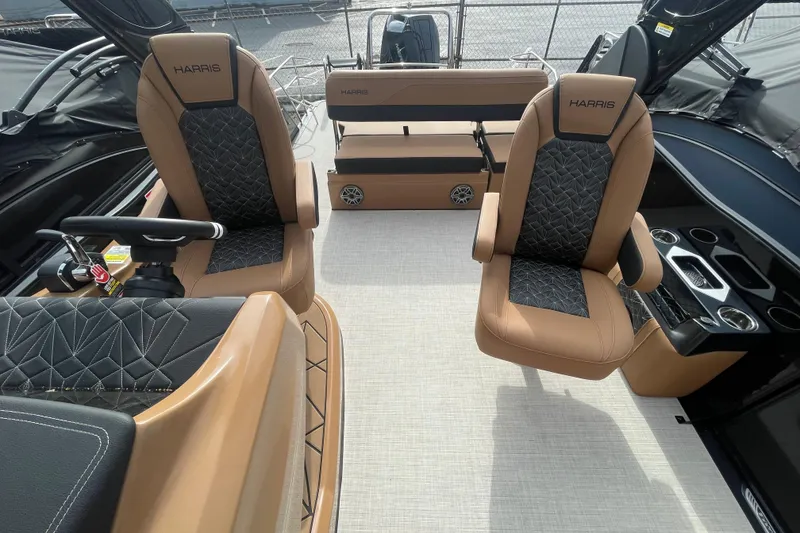Slide: The Image of 2026 Harris Grand Mariner 250 interior with luxurious seating and modern design. - 7