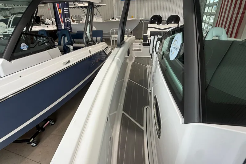 Slide: The Image of 2026 Monterey Elite 30 OB boat interior with sleek design and modern features. - 14