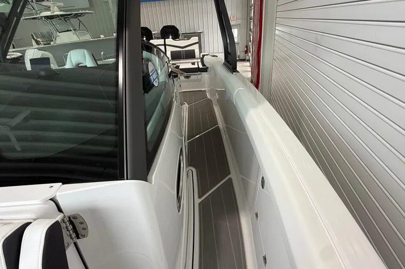 Slide: The Image of 2026 Monterey Elite 30 OB boat interior with sleek design and modern features. - 15