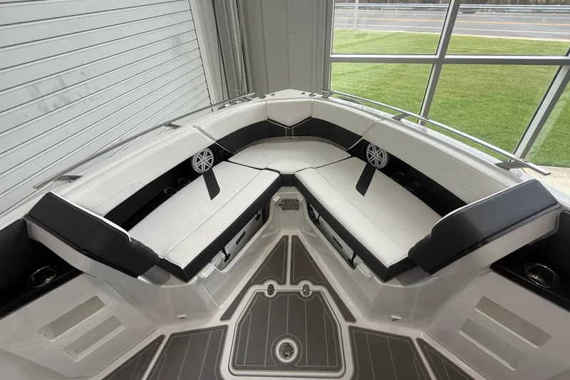 Slide: The Image of 2026 Monterey Elite 30 OB boat interior with sleek seating and modern design. - 8