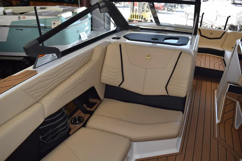 Slide: The Image of Luxurious interior of 2026 Nautique Super Air Nautique G25 Paragon boat. - 10