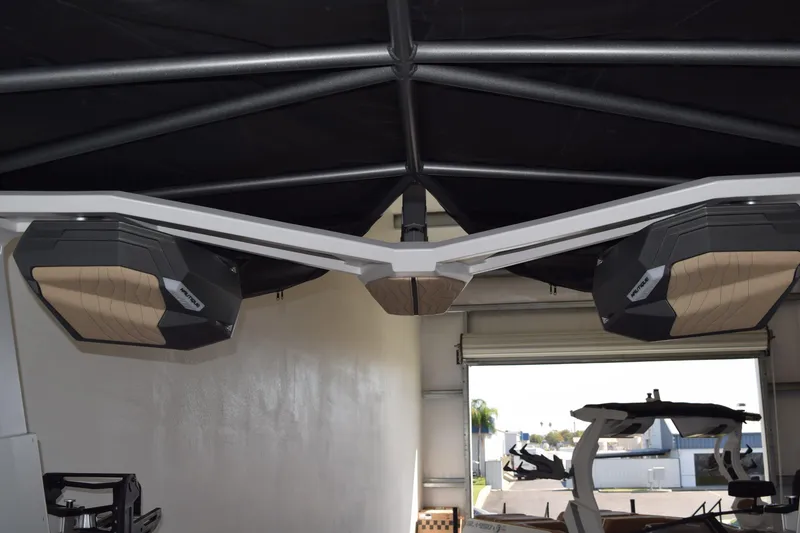 Slide: The Image of 2026 Nautique Super Air Nautique G25 Paragon boat speakers under canopy. - 17